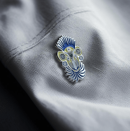 Metal badge "Crowned Ram" by Yellow_Blue_UA based on the paintings of Maria Prymachenko